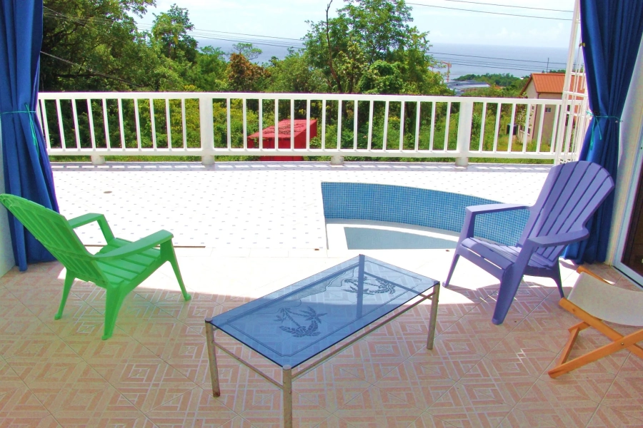 St. Lucia Real Estate Sea View Villa in Castries glass table