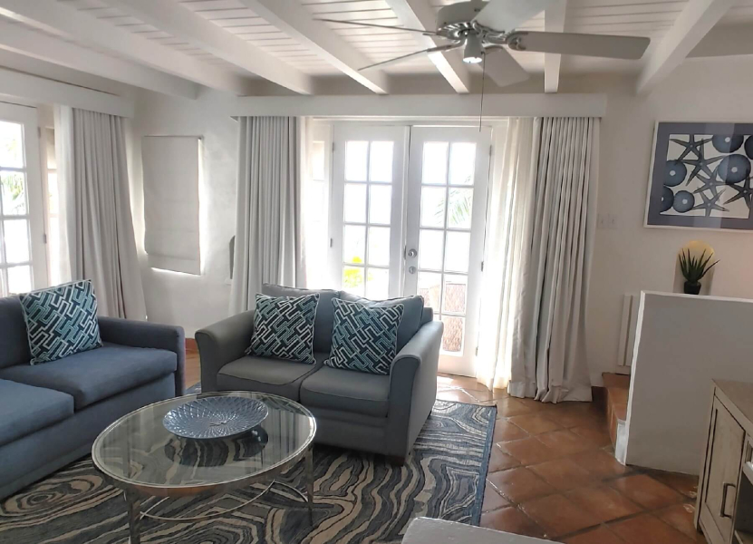 St. Lucia Real Estate Windjammer Landing 2 Bed Villa beautifully decorated living room with ceiling fans