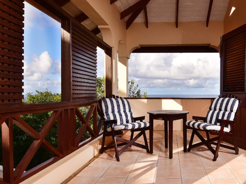 St. Lucia Real Estate Cliffside Oceanview Estate We've patio chairs
