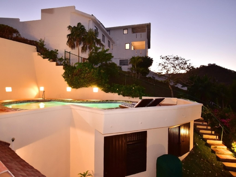 St. Lucia Real Estate Cliffside Oceanview Estate outdoor view of pool area at sunset
