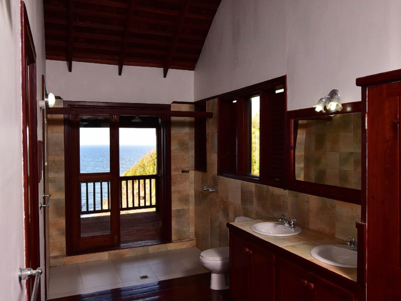 St. Lucia Real Estate Cliffside Estate bathroom with views of the Atlantic Ocean